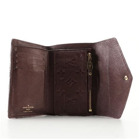 louis vuitton monogram empreinte compact curieuse wallet|louis vuitton embossed handbags.